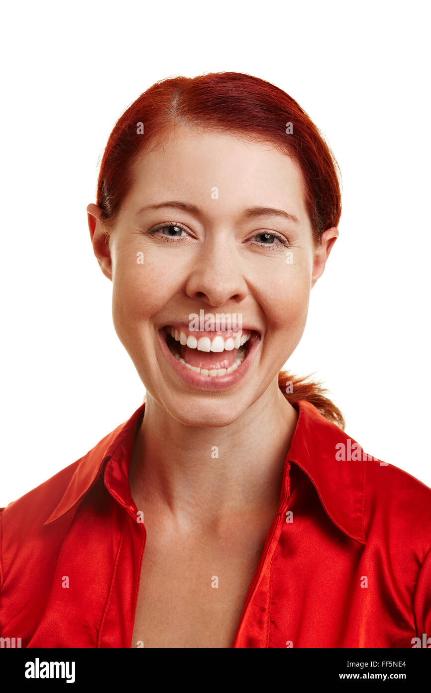 Colpo alla testa di sorridenti donna con capelli rossi Foto Stock
