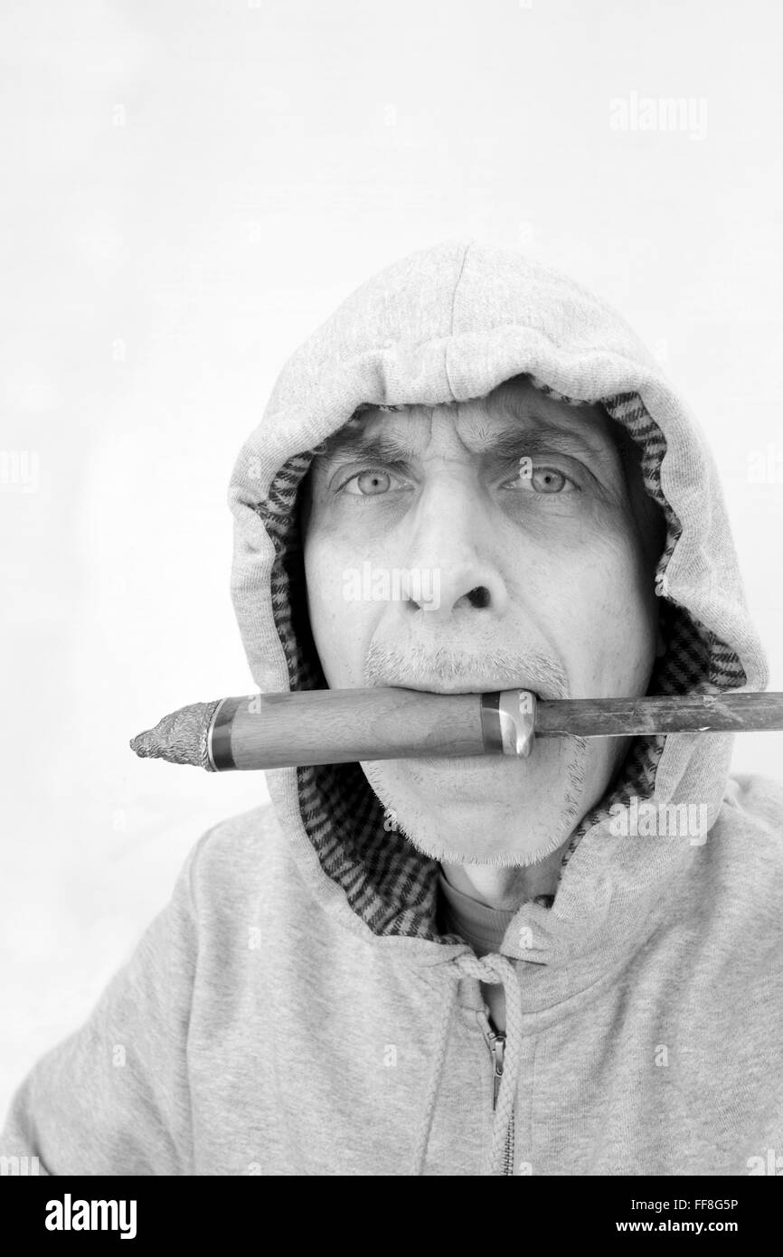 Uomo con la lama Foto Stock