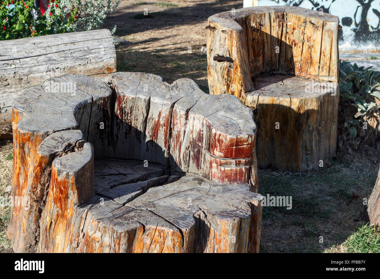Dallas Deep Ellum Texas sedie intagliate monconi moncone albero di legno di legno Foto Stock