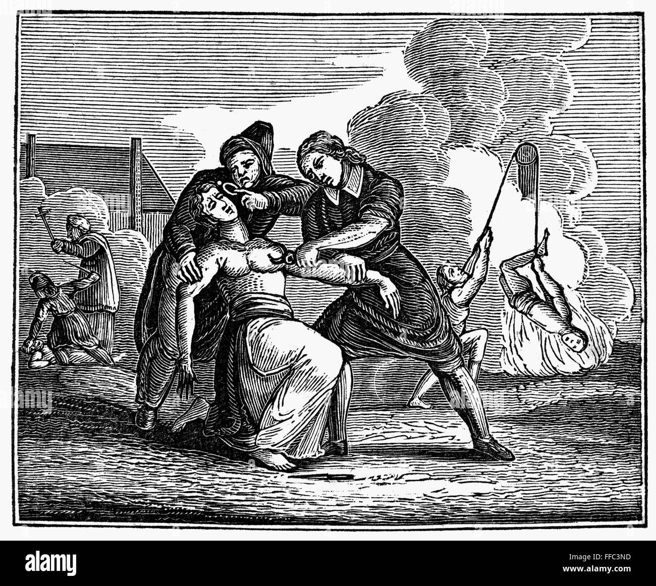 La Tortura Medievale. /NMedieval metodi di punire gli eretici. Xilografia contemporanea. Foto Stock