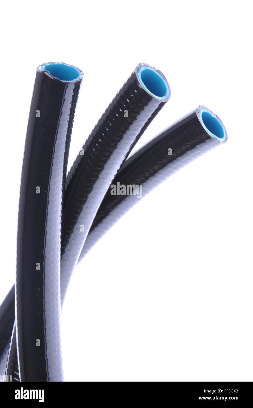 Pressione tubi flessibili in gomma isolati su sfondo bianco Foto Stock