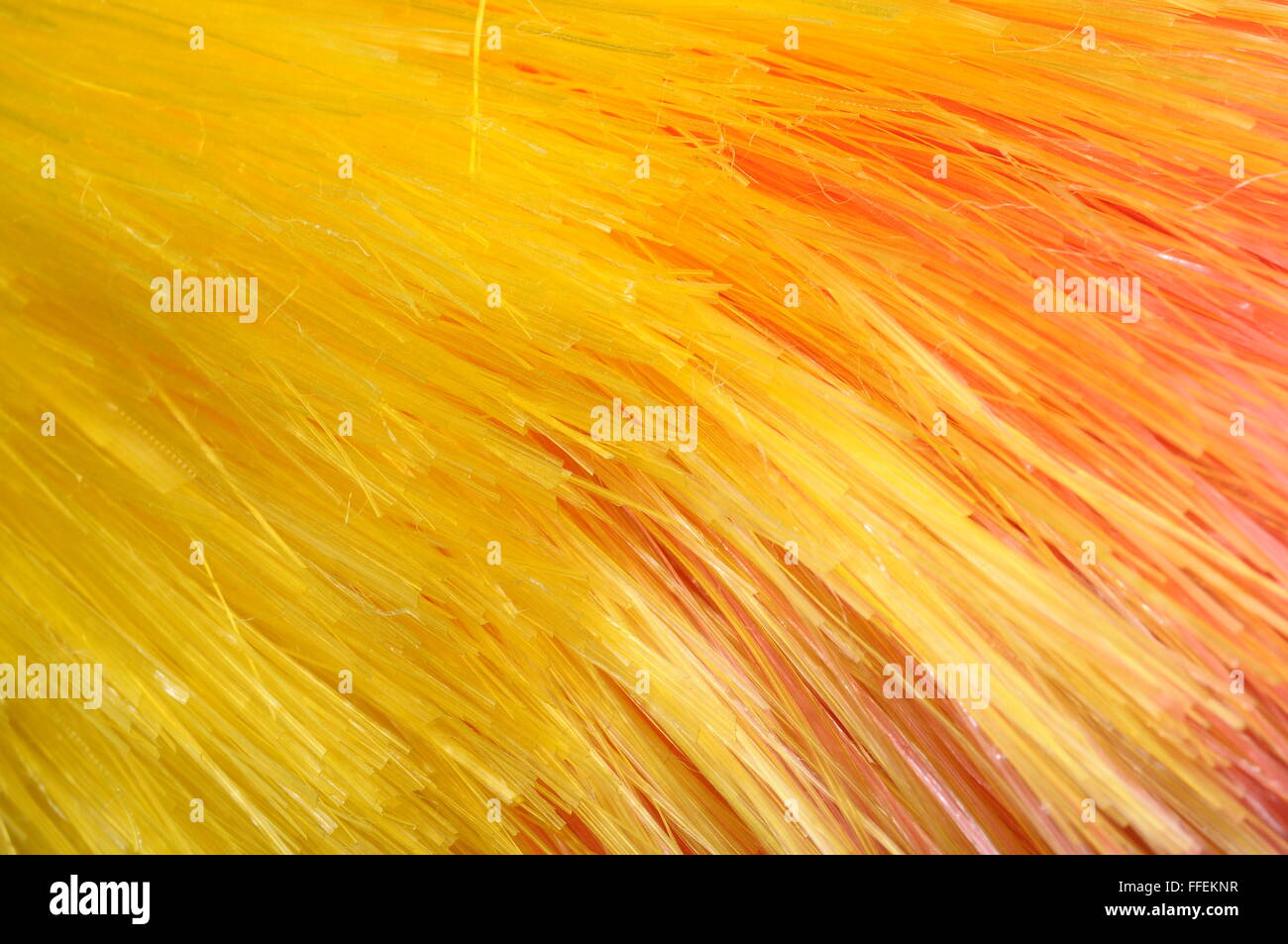 Macro di orange sfondo colorato di fibre sintetiche Foto Stock