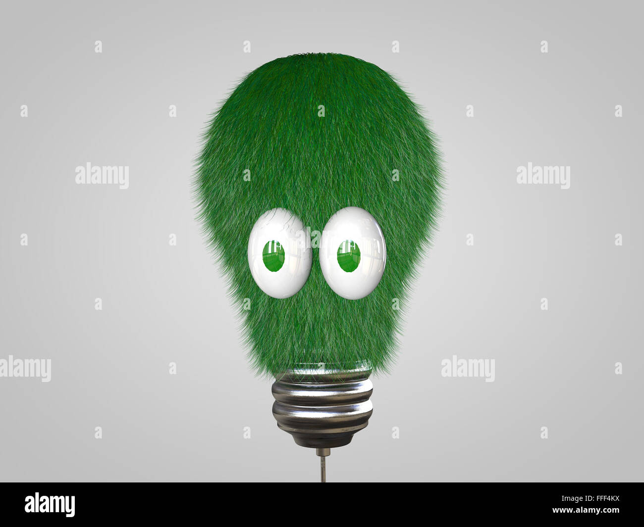 Lampadina della luce con gli occhi coperti in erba verde. Foto Stock