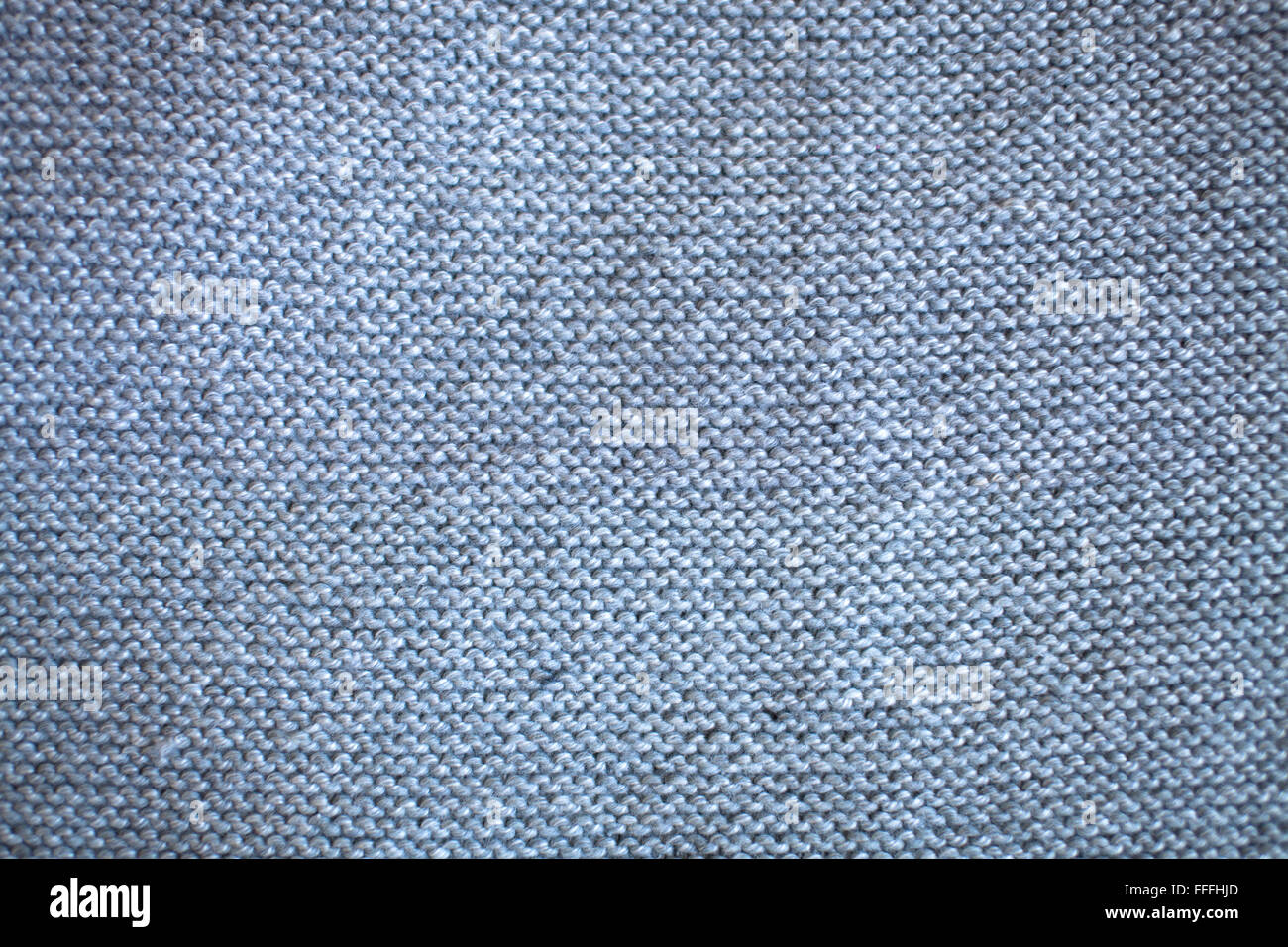 Tessuto a maglia grigia modello di tessitura, lavorazione a maglia Foto Stock
