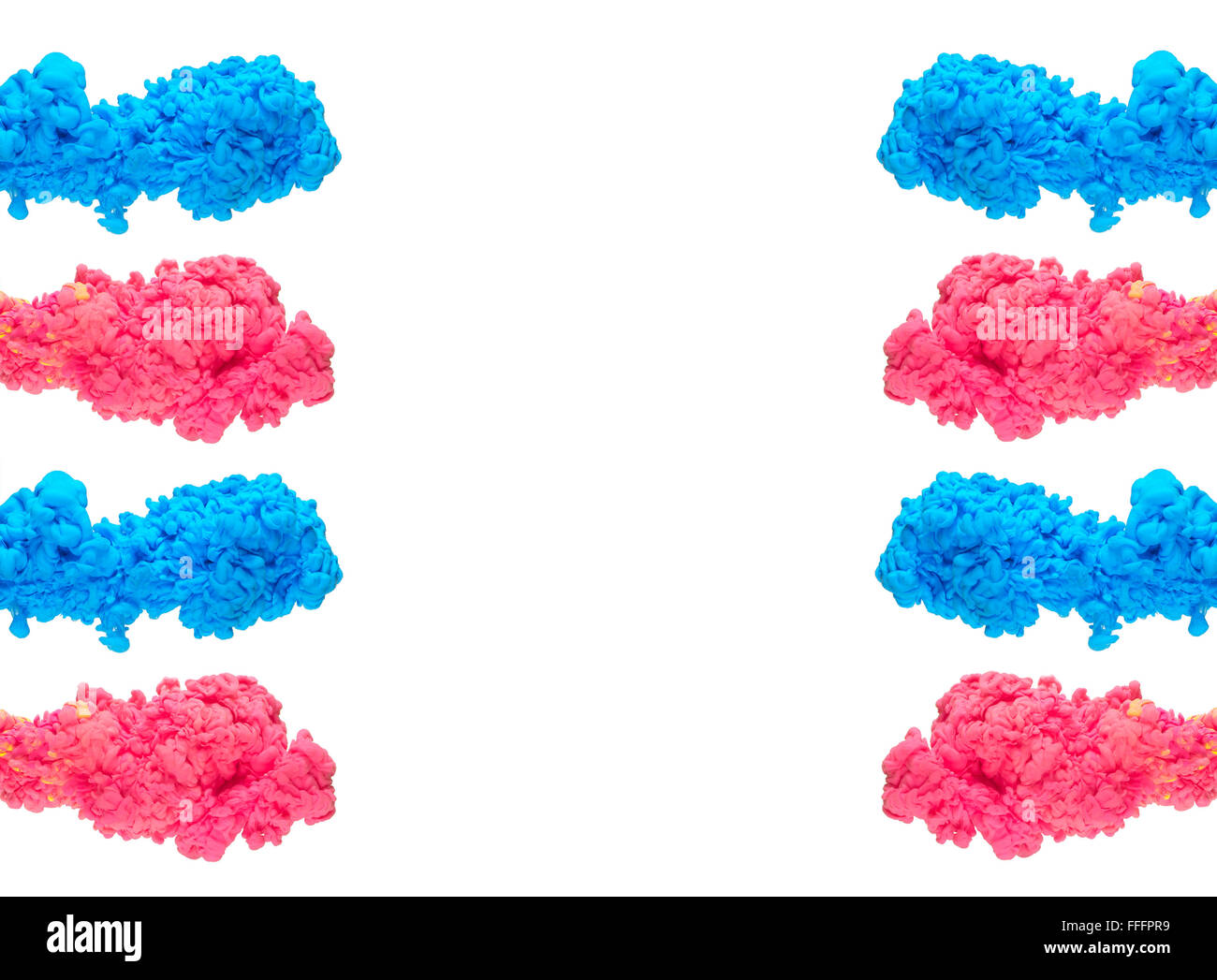 Inchiostro multicolore goccia agitando in acqua, crea una forma organica di struttura setosa, con colori caldi. Foto Stock