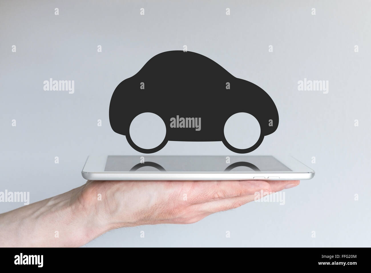 Mobilità digitale e di mobile computing di concetto. Nero auto icona come esempio per il trasporto di sovvertimento e servizi di taxi. Foto Stock
