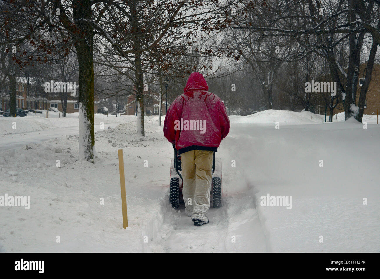 Uomo di neve un marciapiede Foto Stock