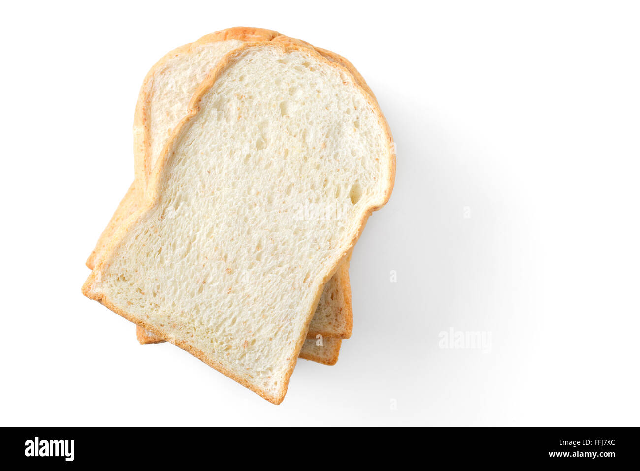 Cumulo di fette di pane su sfondo bianco Foto Stock