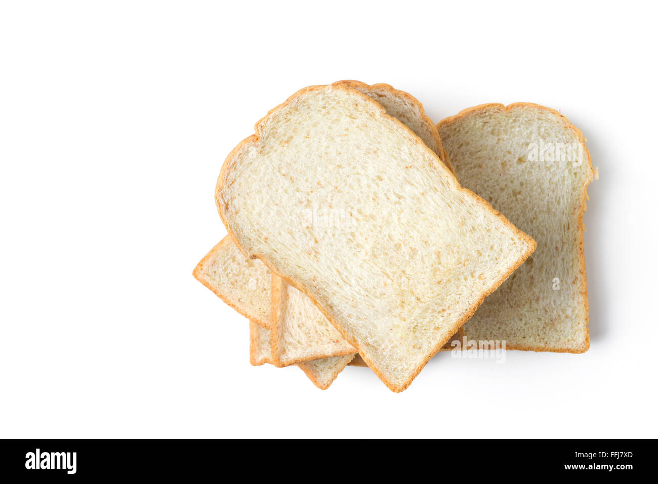 Cumulo di fette di pane su sfondo bianco Foto Stock
