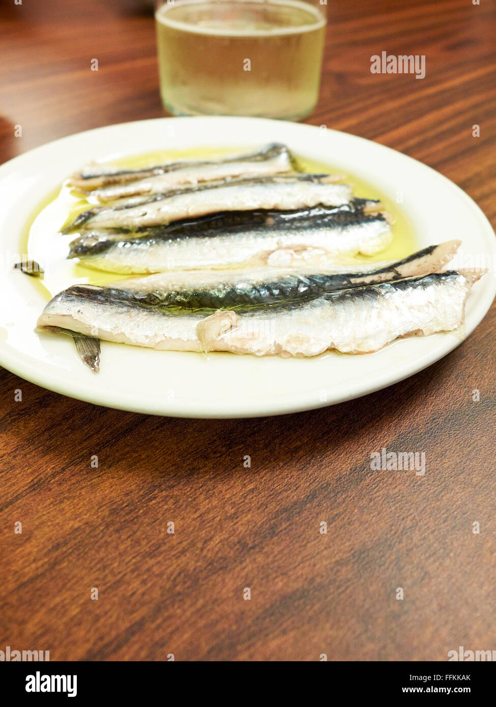 Lo spagnolo Boquerones (acciughe marinate in olio d'oliva). Foto Stock