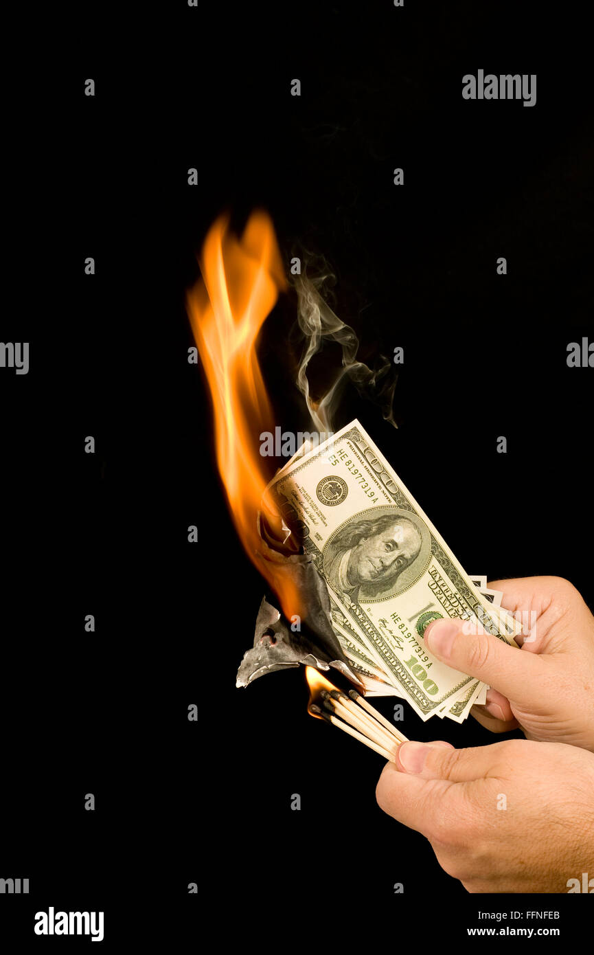 Soldi In fumo Foto Stock