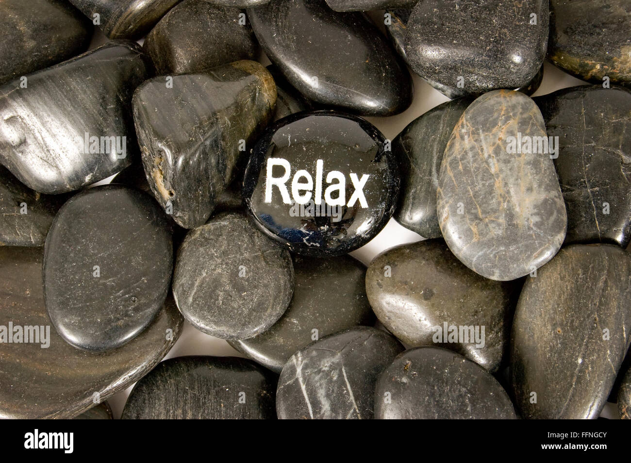 Rilassatevi incoraggiamento pietra sul fiume rocce Foto Stock