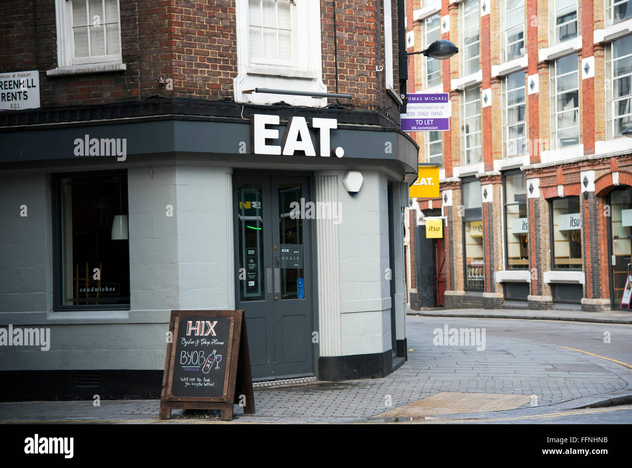 Mangiare fast food ristorante della catena Cowcross Street Foto Stock