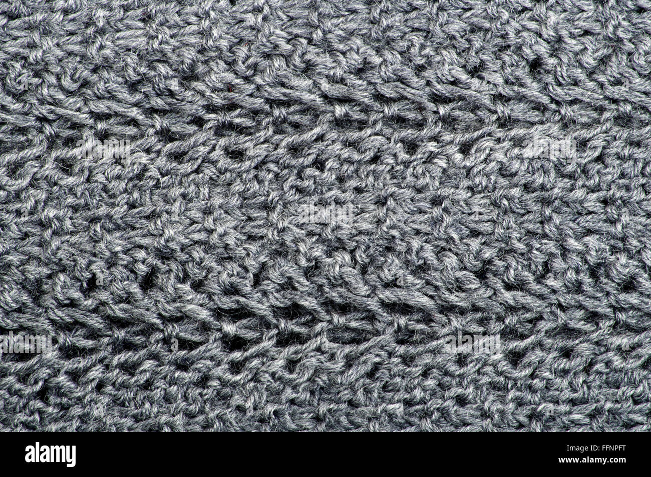 Grigio sfondo a maglia stretta fino in dettaglio Foto Stock