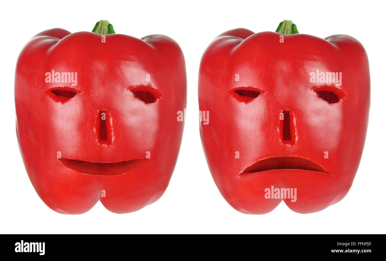 Peperoni rossi con Volti Foto Stock