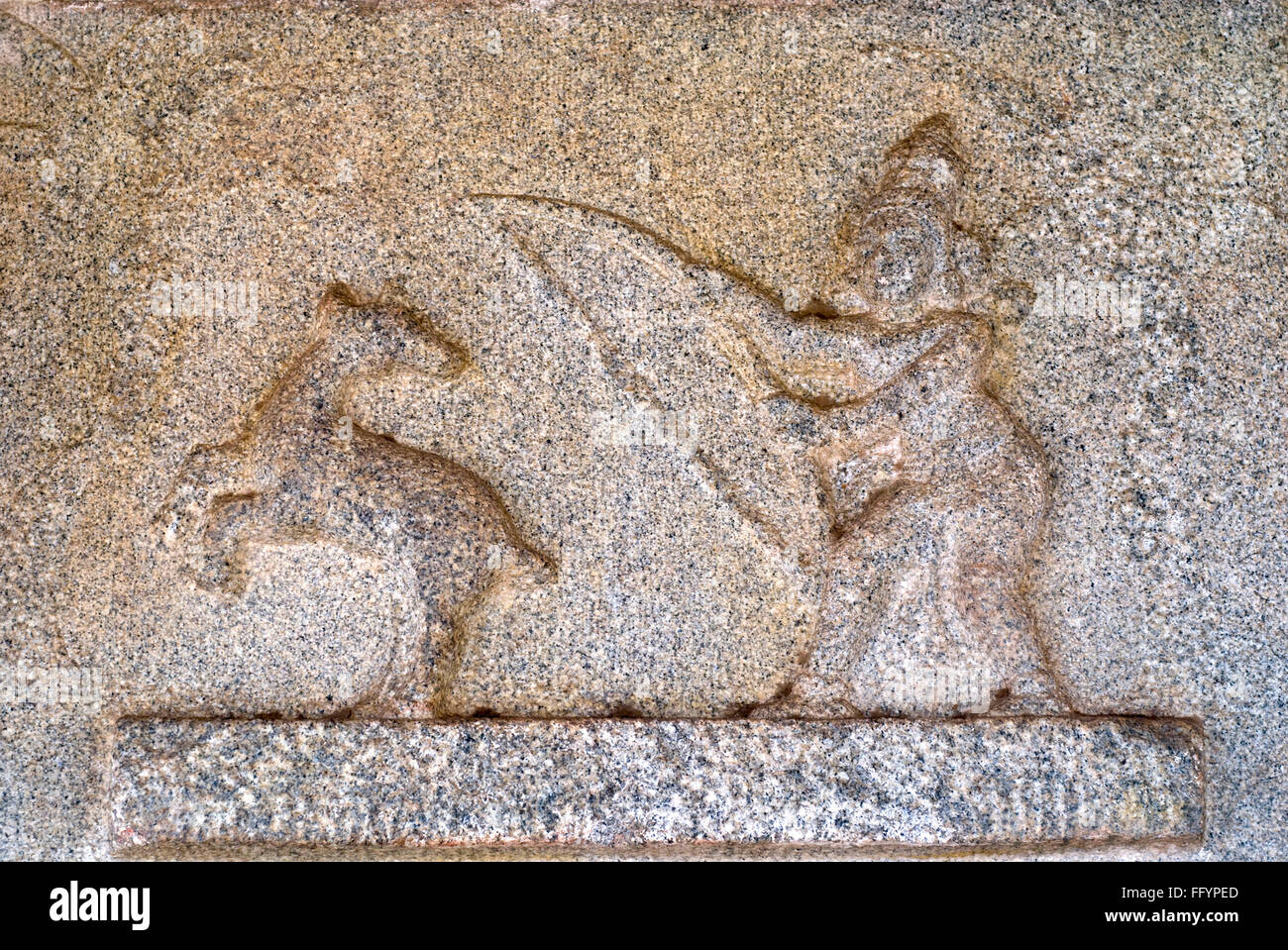 Cavallo uomo sulla parete esterna di Ramachandra tempio di Hampi , Karnataka , India Foto Stock