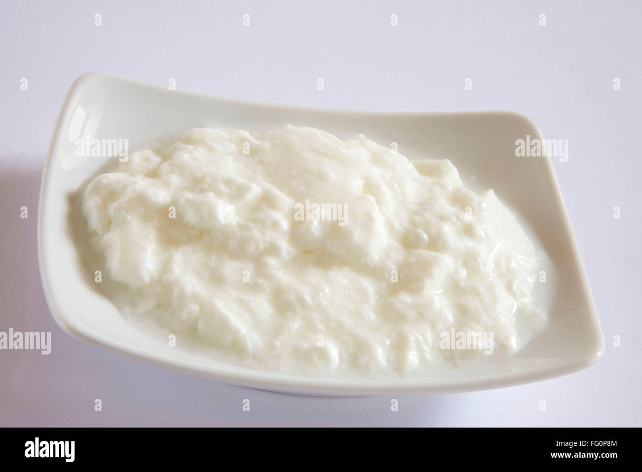 Cagliata dahi yogurt fatto da parte coagulata di latte inacidito home o prodotti lattiero-caseari Foto Stock