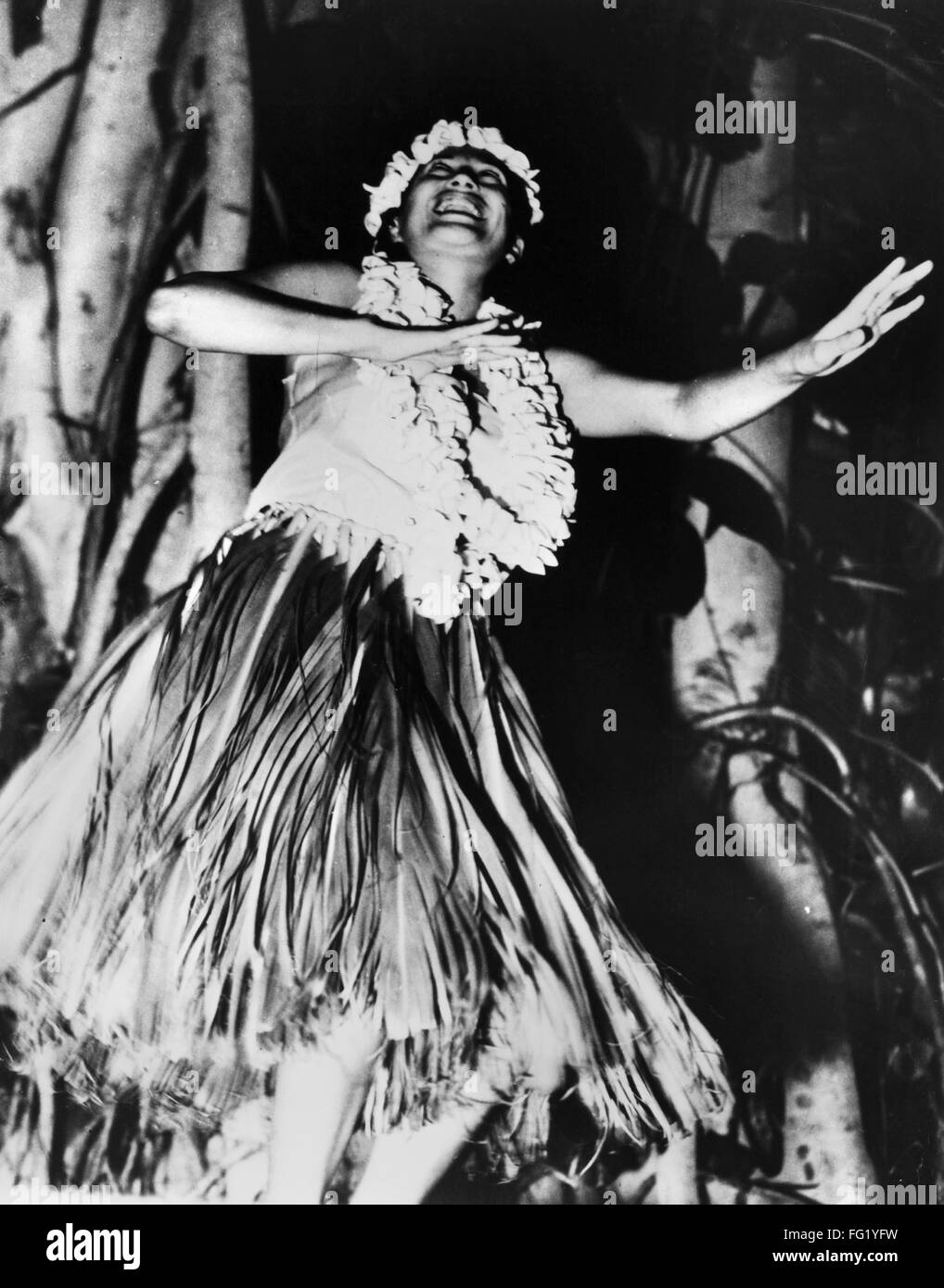 HAWAII: ballerina di hula. /NA nativo di hula Hawaiana ballerino. Fotografia, metà del XX secolo. Foto Stock