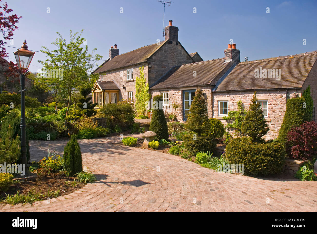 Extended Derbyshire cottage del sole Foto Stock