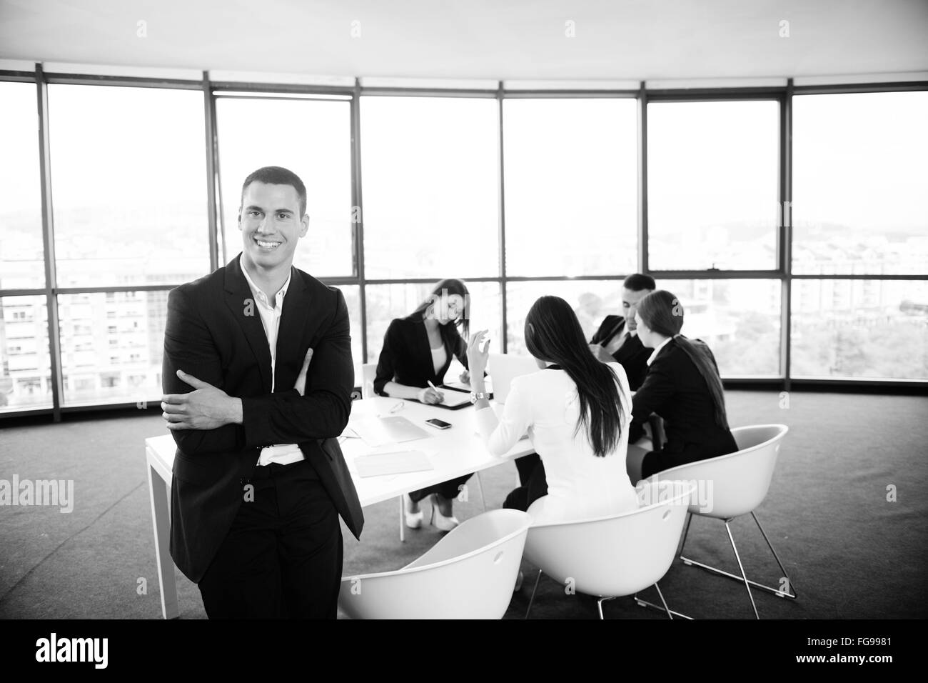 La gente di affari in una riunione in ufficio Foto Stock