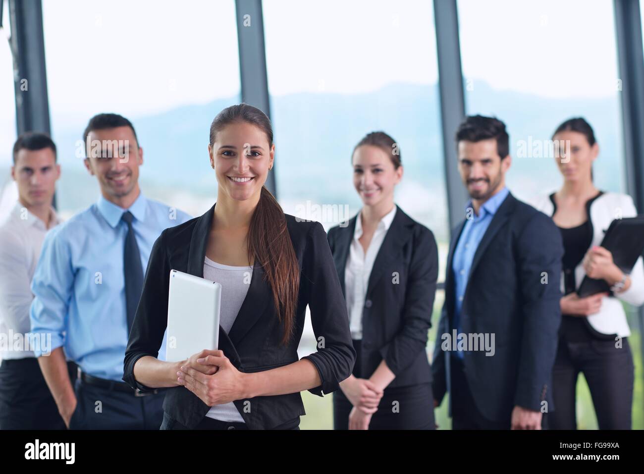 La gente di affari in una riunione in ufficio Foto Stock