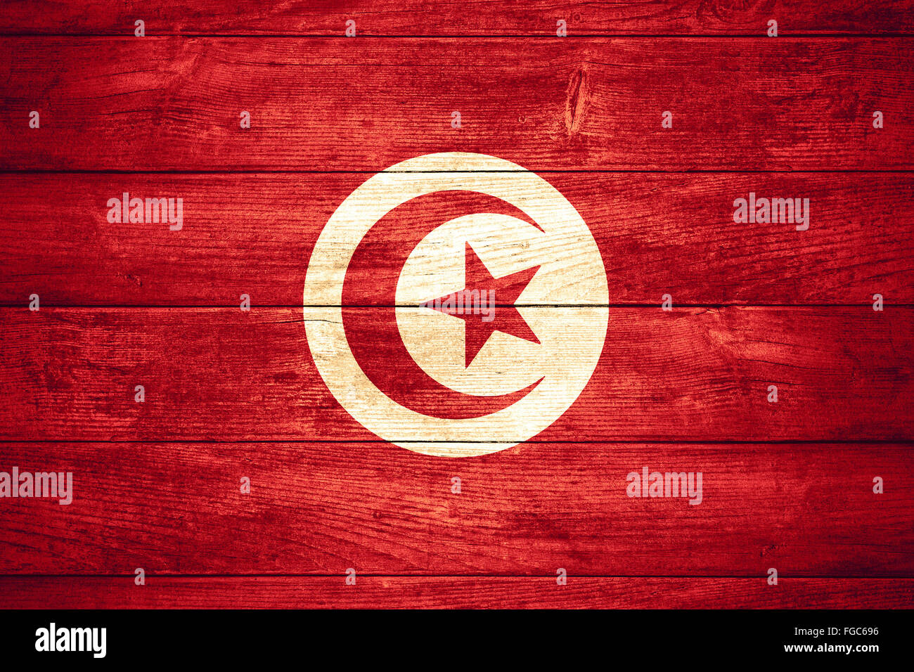 Bandiera della Tunisia o banner tunisino su sfondo di legno Foto Stock
