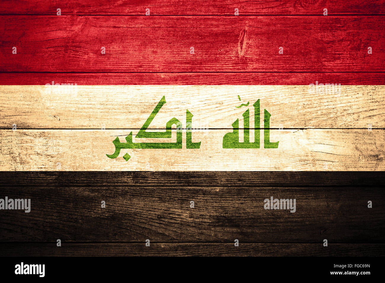 Bandiera dell'Iraq o irachena banner su sfondo di legno Foto Stock