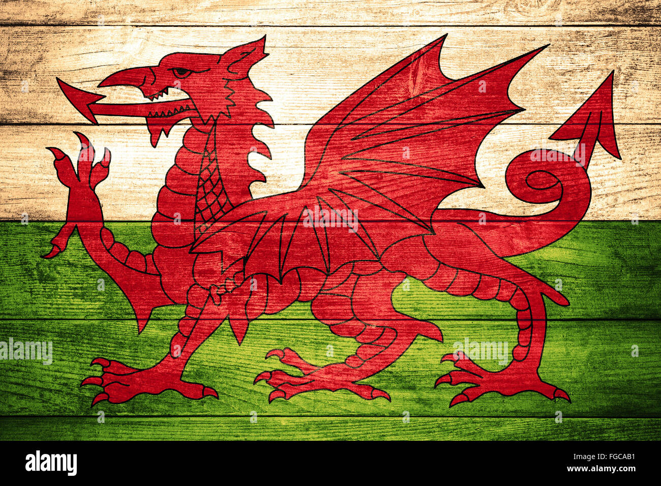 Bandiera del Galles o Welsh banner su sfondo di legno Foto Stock