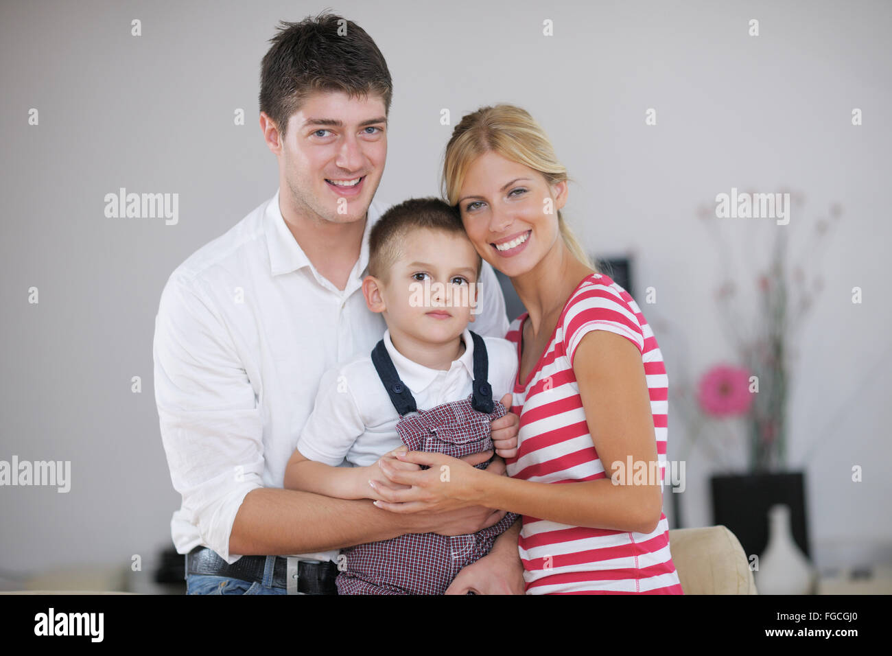 famiglia a casa Foto Stock