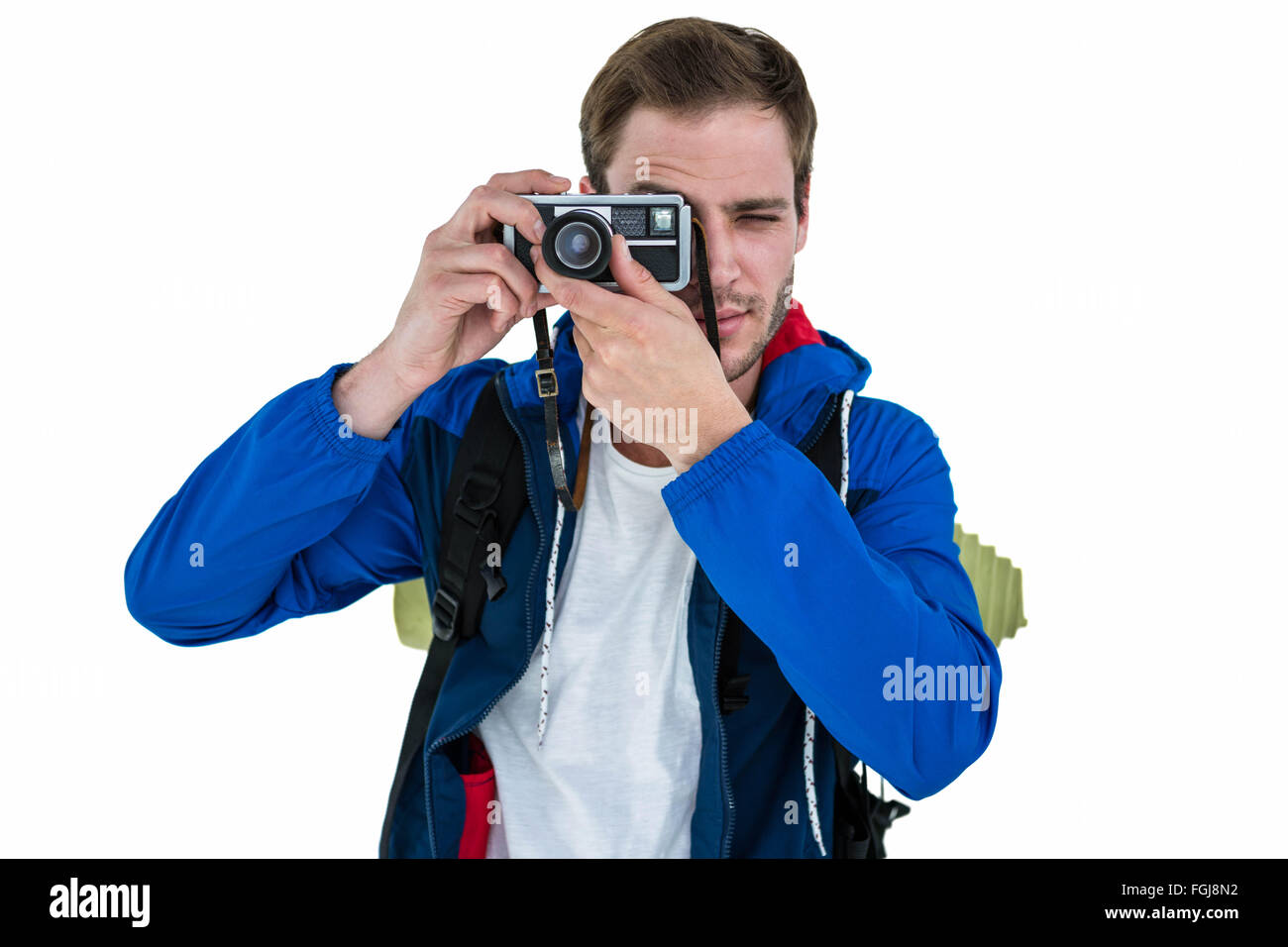 Backpacker hipster scattare foto con una fotocamera retrò Foto Stock