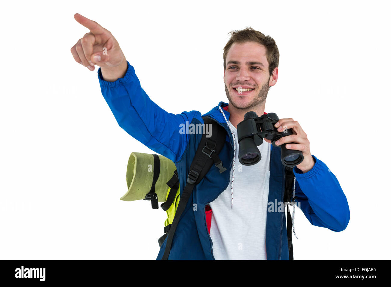 Backpacker hipster puntando tenendo il binocolo Foto Stock