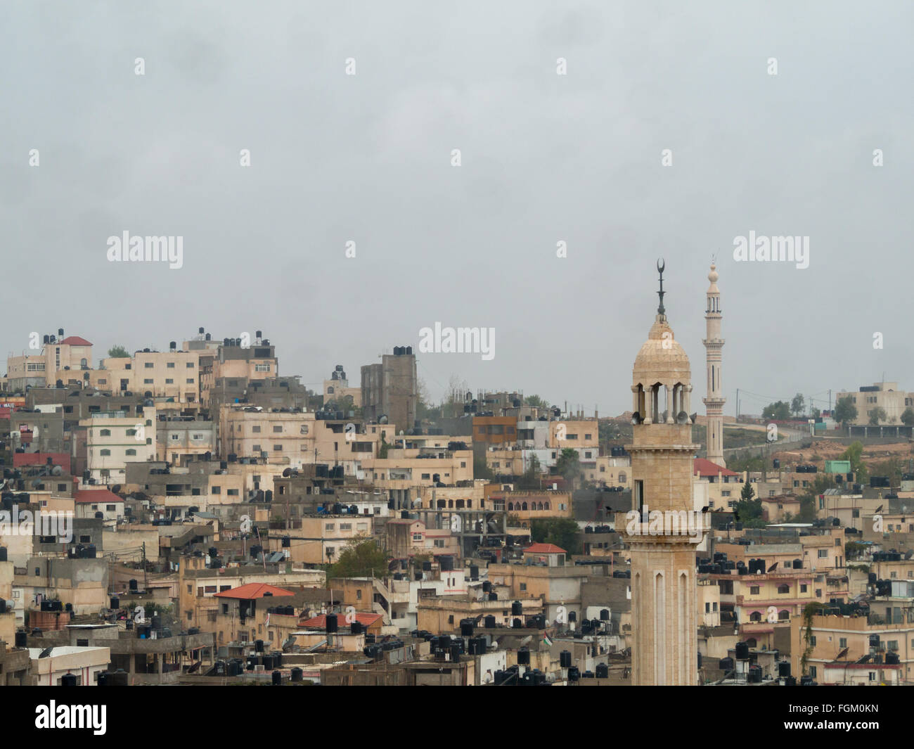 I minareti e le case nelle colline di Ramallah Foto Stock