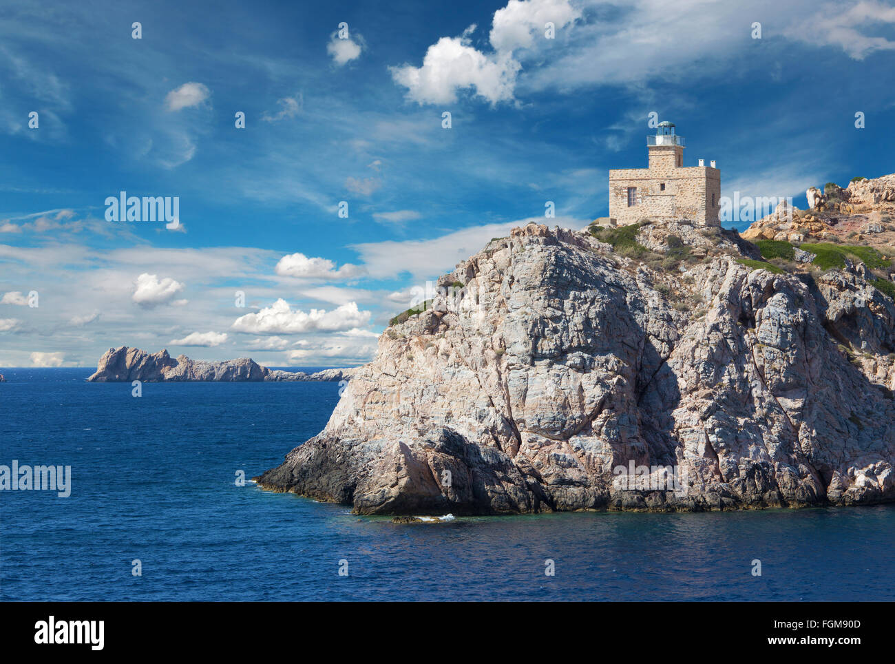 Il faro di Isola greca in Ios Cicladi gruppo nel Mare Egeo Foto Stock