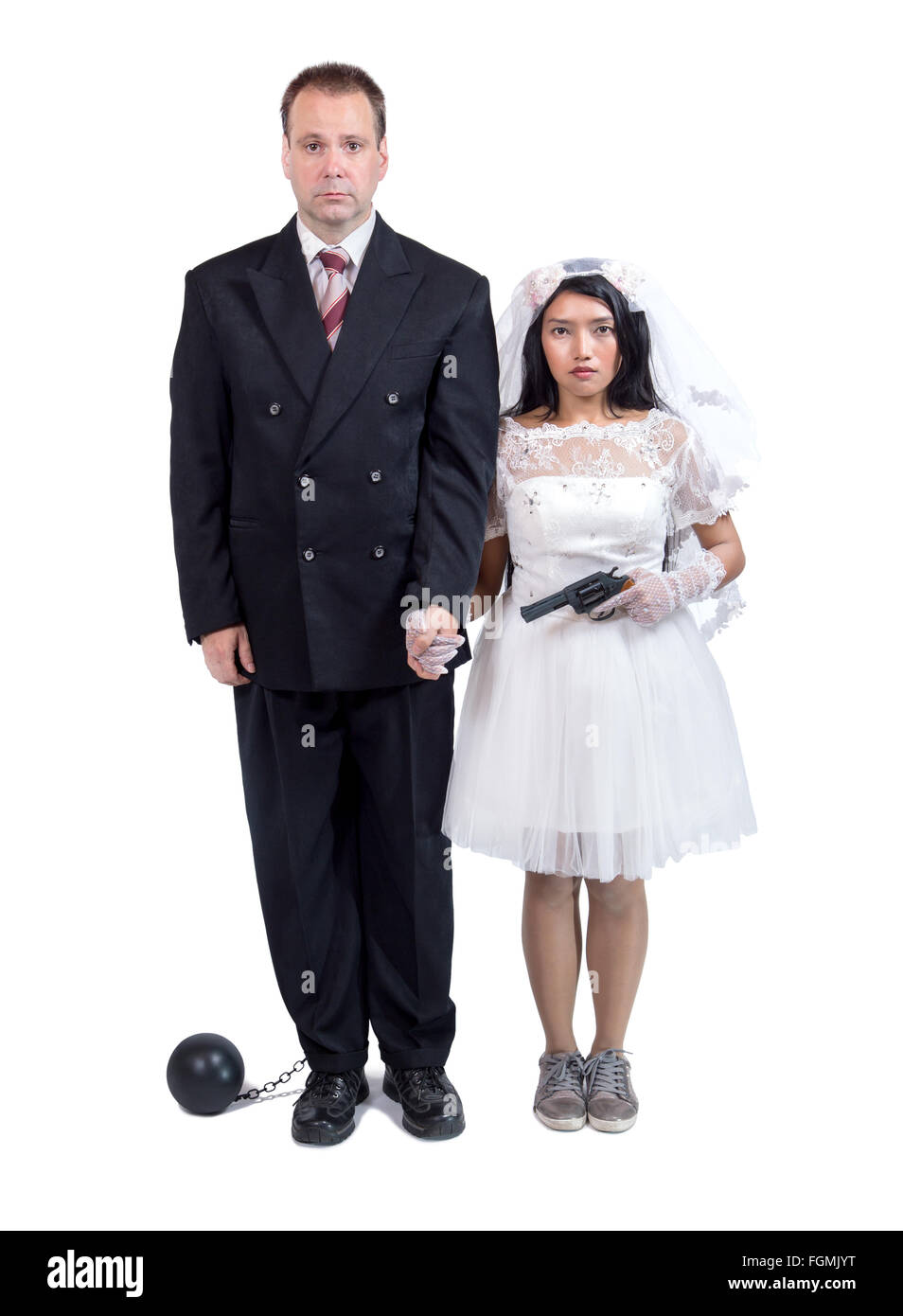 Sposa con la pistola minaccia il suo sposo Foto Stock