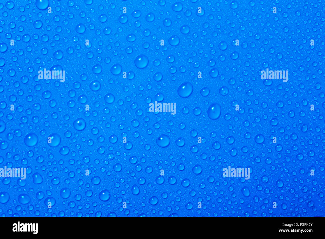 Acqua blu sullo sfondo di gocce Foto Stock
