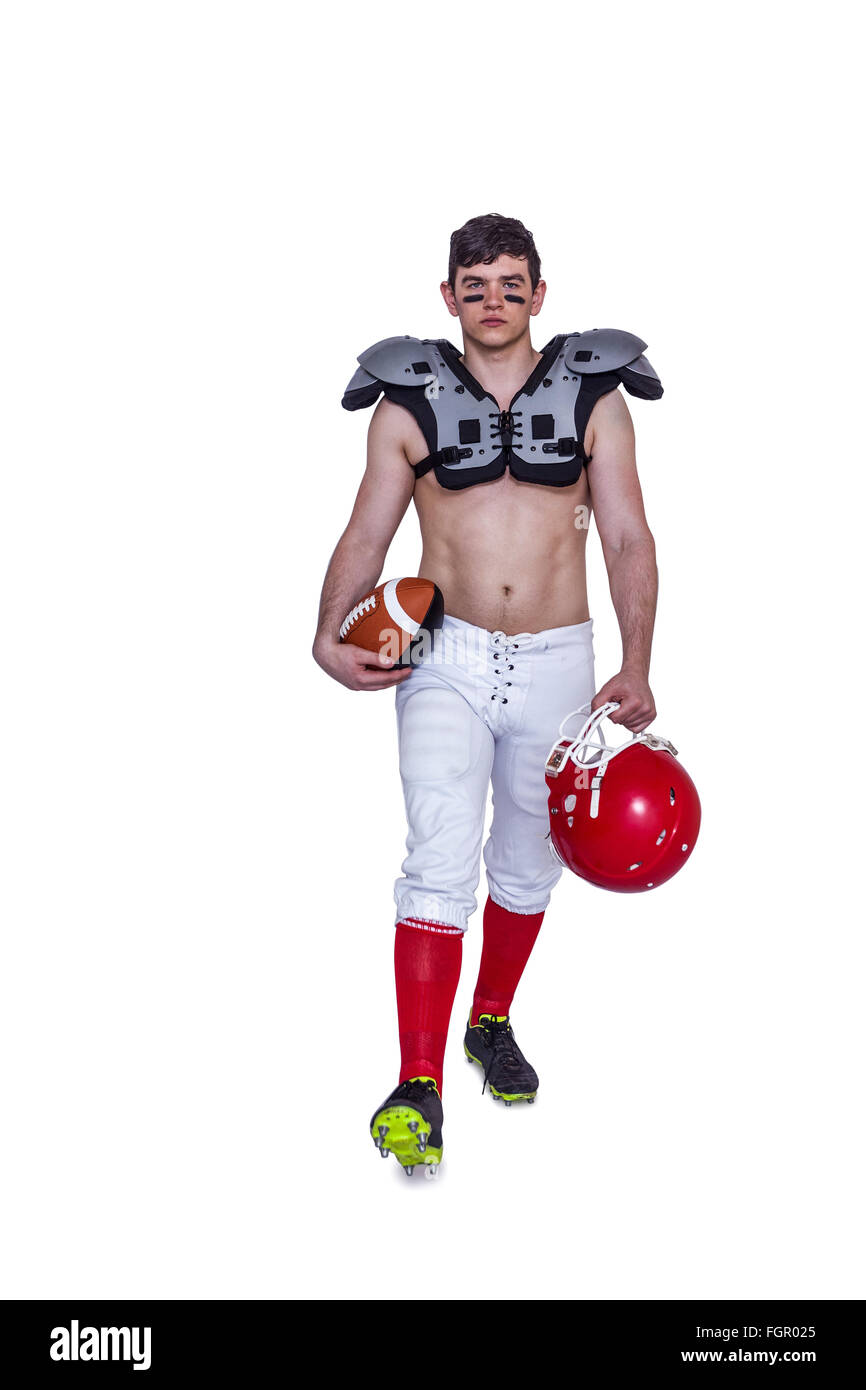 Primo piano ritratto del calciatore americano in attrezzature sportive,  casco e guanti isolati su sfondo bianco studio. Concetto di sport Foto  stock - Alamy