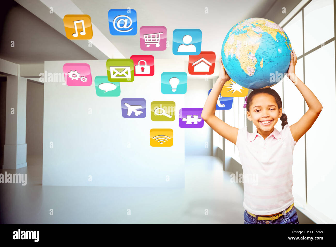 Immagine composita di felice pupillo holding globe Foto Stock