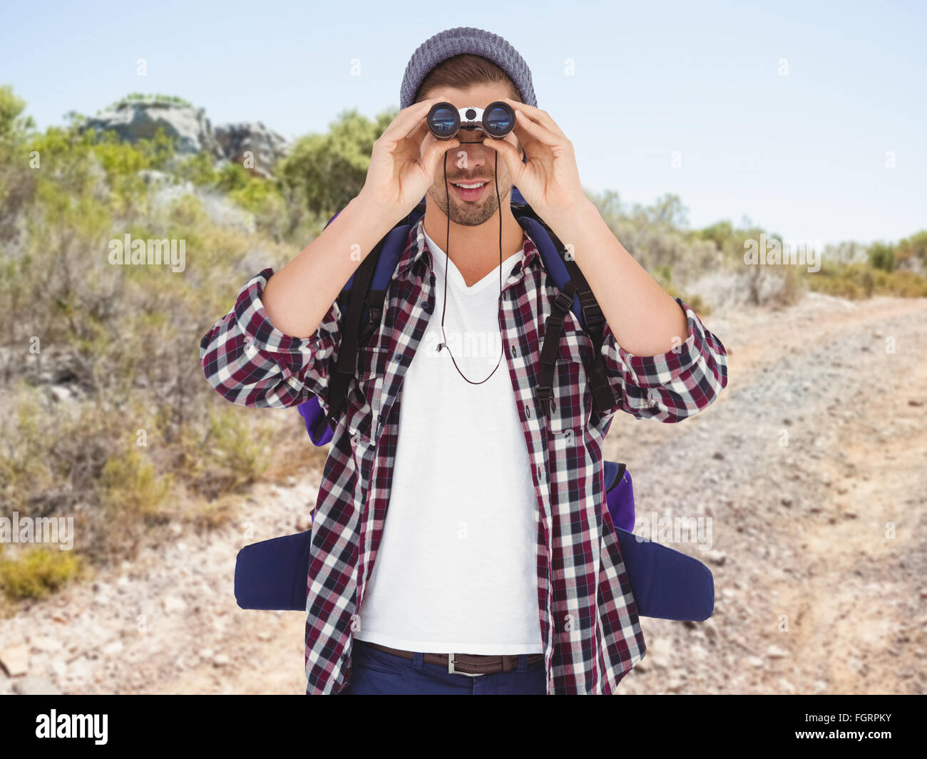 Immagine composita dell uomo alla ricerca attraverso il binocolo Foto Stock