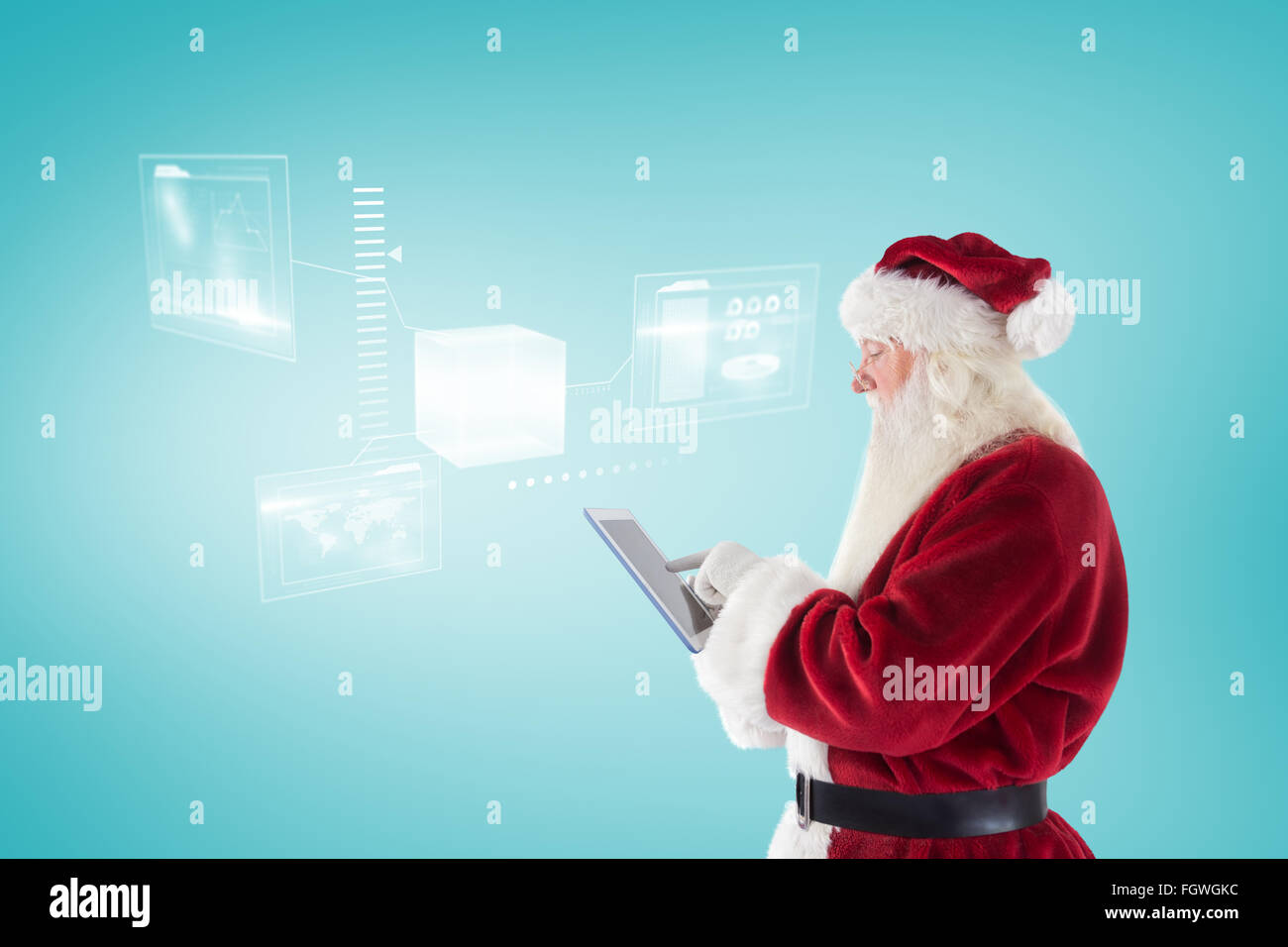 Immagine composita di santa utilizza un tablet pc Foto Stock