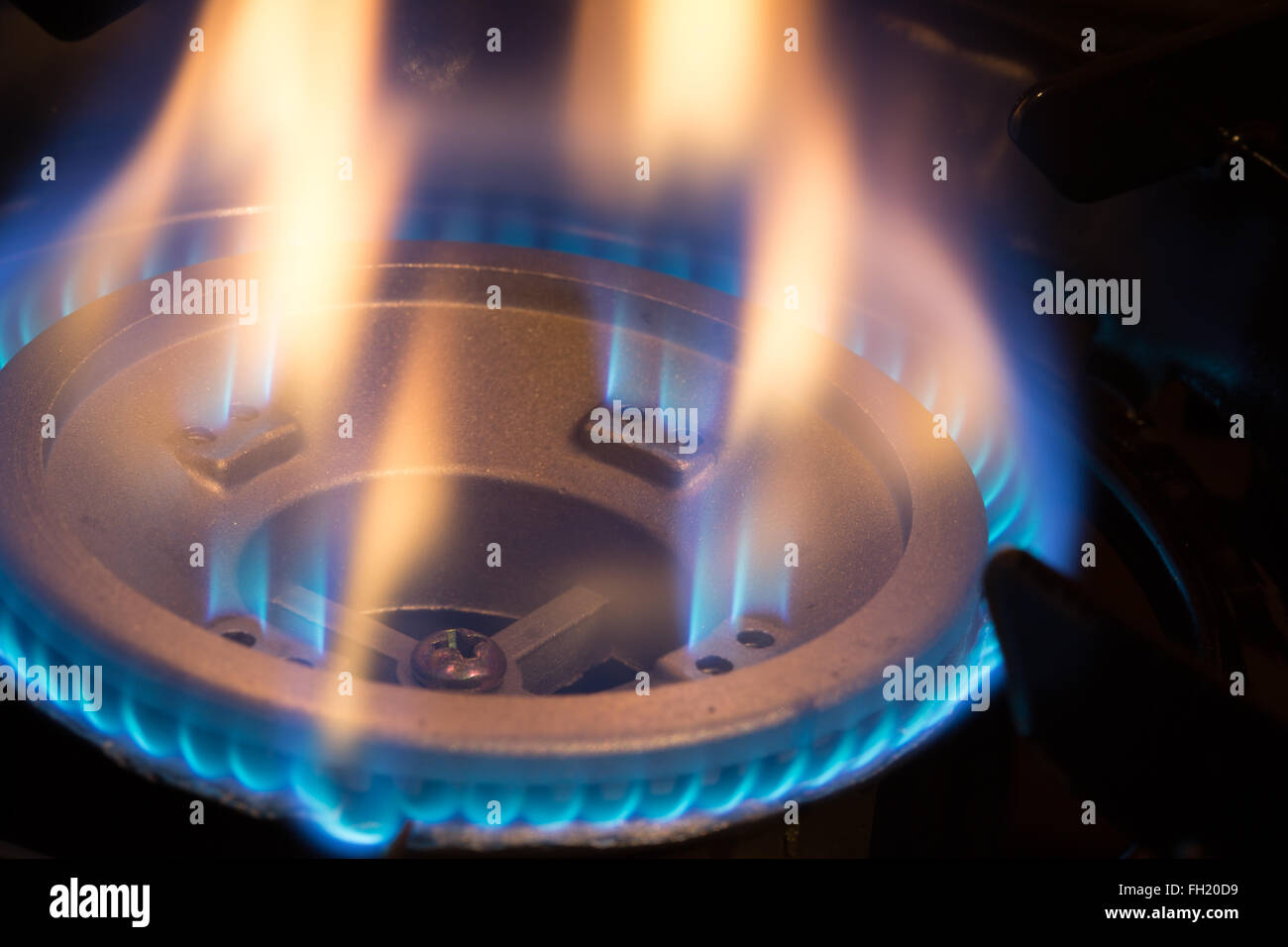 Un vicino l immagine di un bruciatore a gas/fornelli utilizzato per la cottura di cibo quando camping Foto Stock