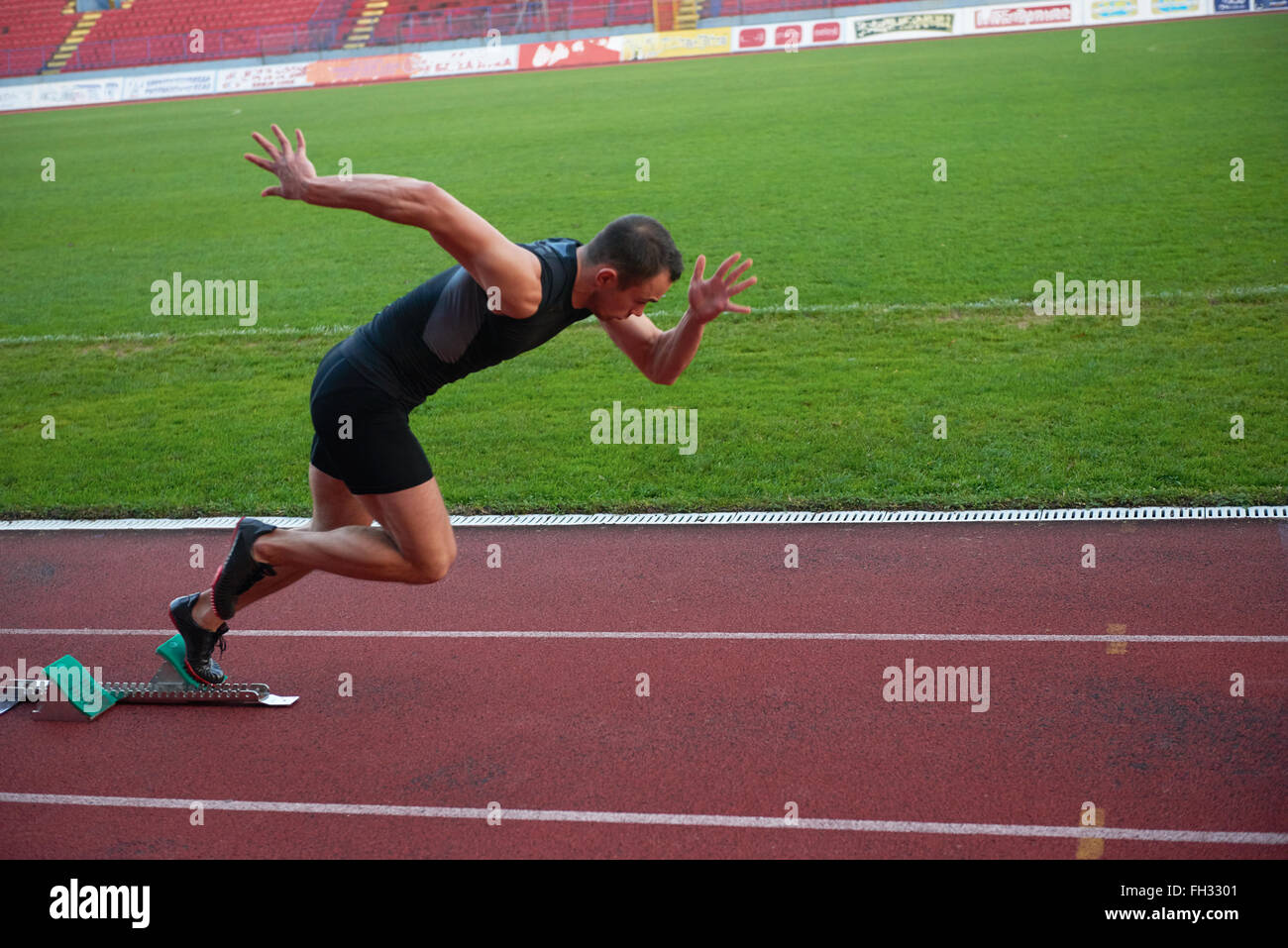 Athletic man start Foto Stock