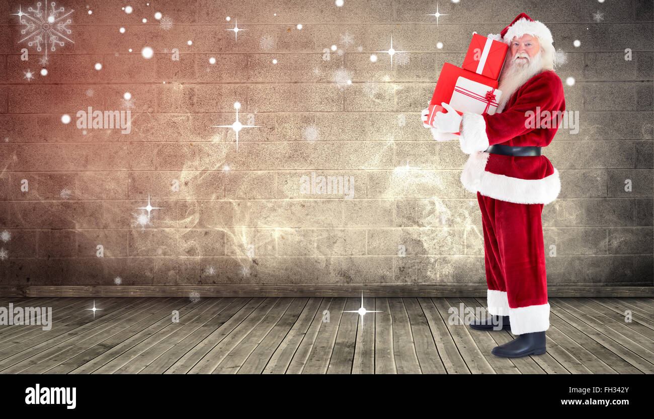 Immagine composita di santa portando doni Foto Stock