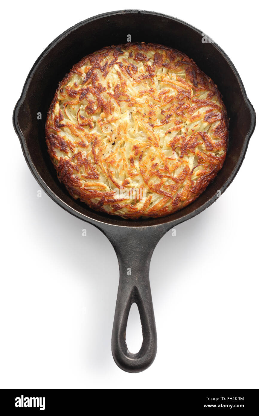 Shredded patate saltate su entrambi i lati finché non diventa croccante e dorata. Foto Stock