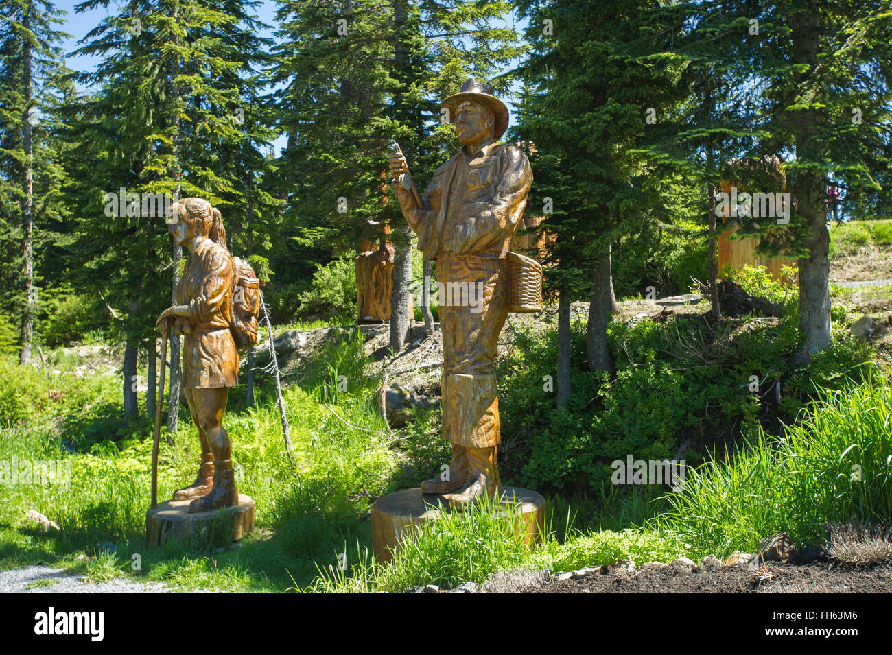 Accedere sculture in legno, Grouse Mountain, British Columbia Foto Stock