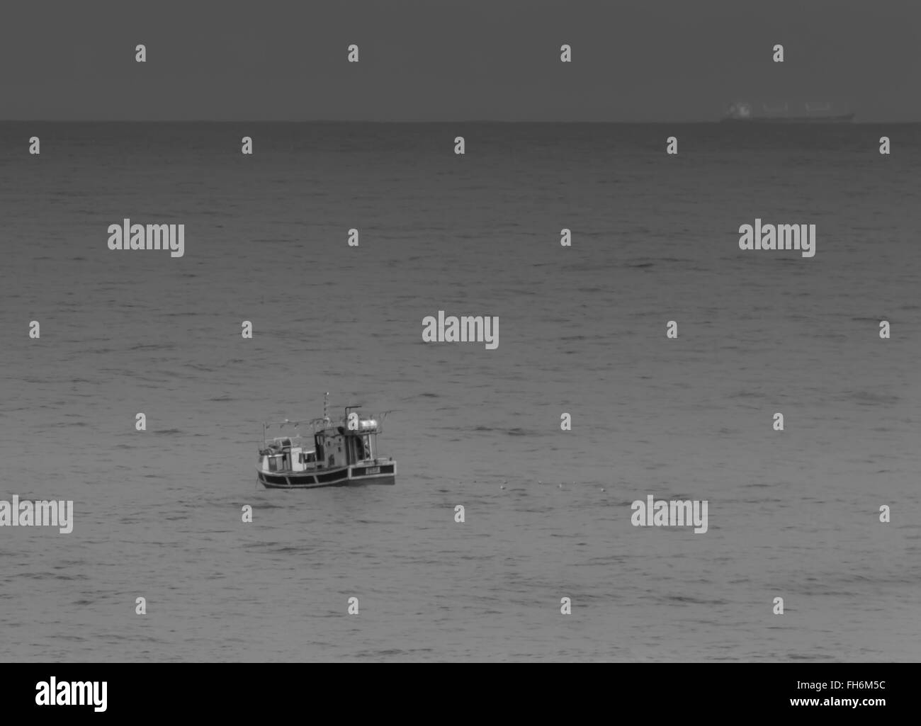 Barca da pesca in mare Sud Africa Foto Stock