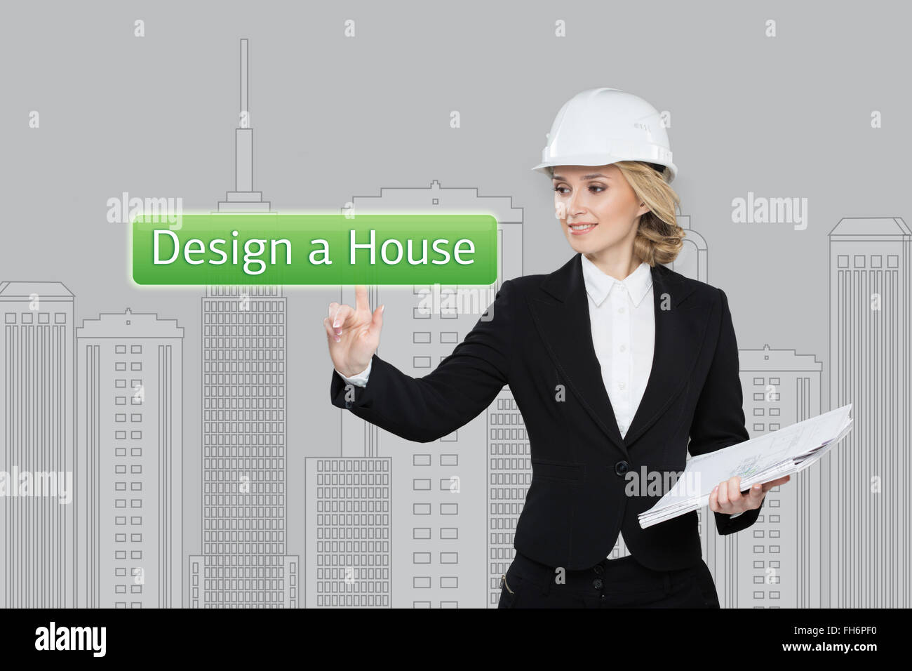 Business Woman desing premendo un pulsante hause su schermi virtuali. Blocchi residenziali. Business, tecnologia internet e il concetto di rete Foto Stock
