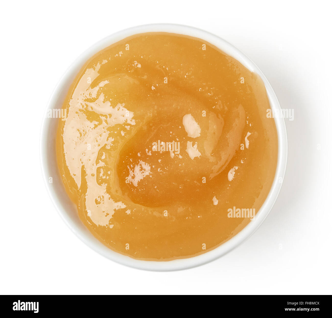 Ciotola di miele su sfondo bianco, vista dall'alto Foto Stock