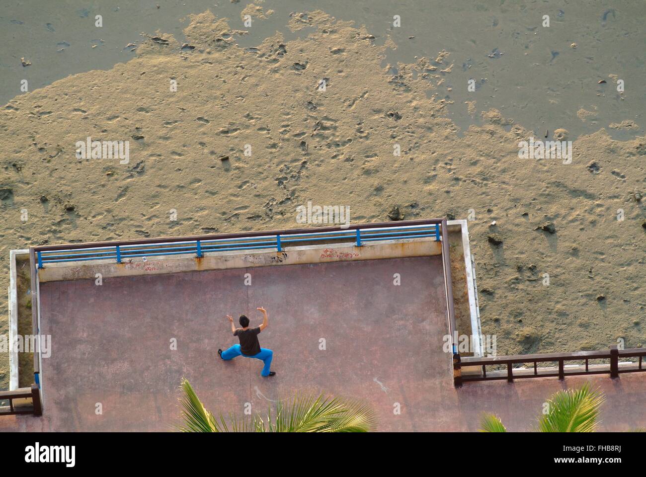 Tempo di Qigong. mattina presto di Sanya. Foto Stock