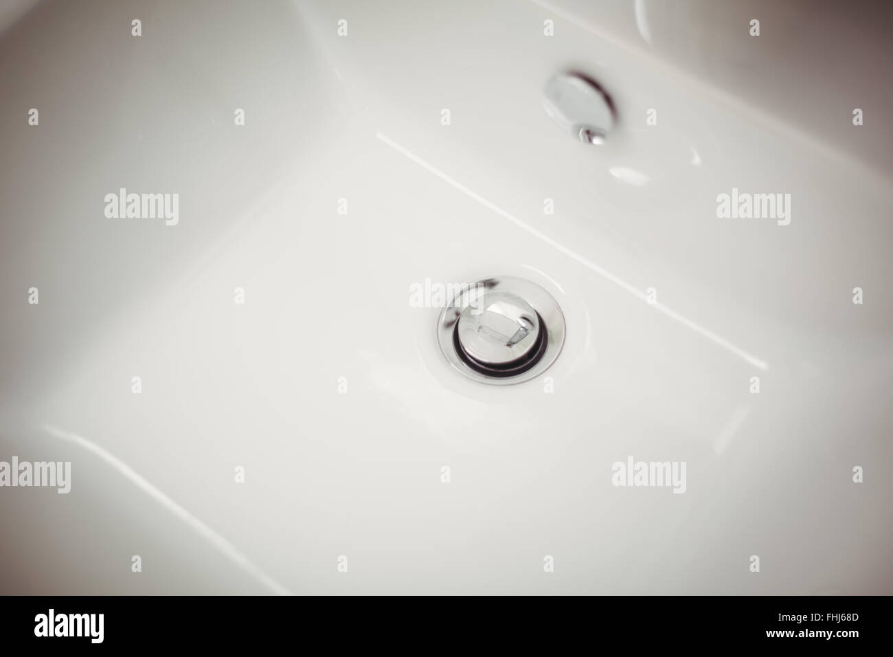 Dissipatore di bianco in un bagno Foto Stock
