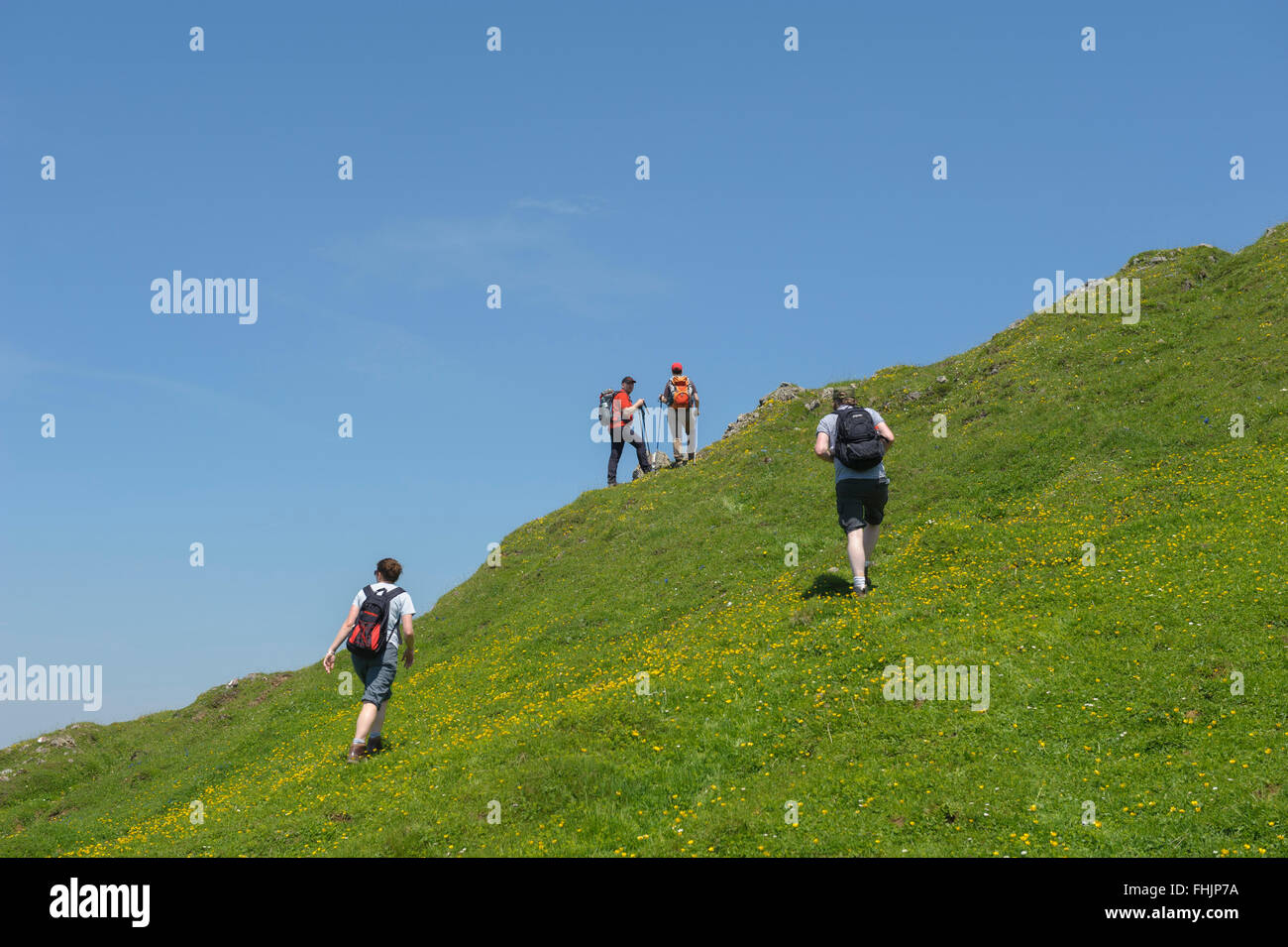 Gli escursionisti la scalata al vertice di Karstein. Kitzbuehel. Tirolo. Austria. Foto Stock